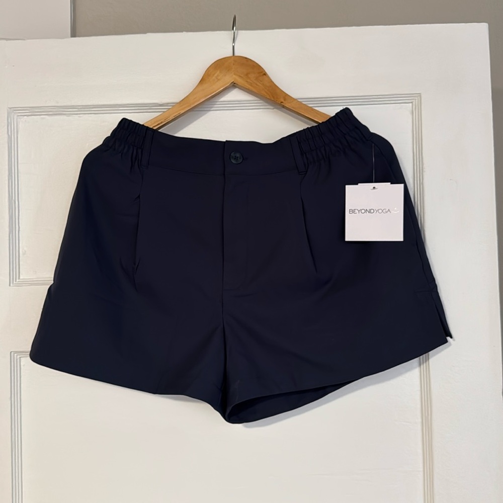 Brand new Beyond Yoga shorts. Size M. Button and zipper. Stretchy with pockets.